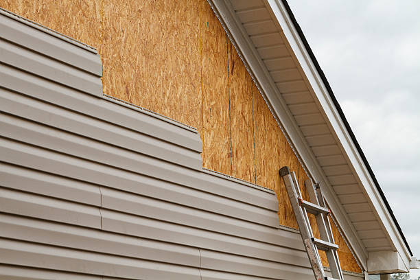 Professional Siding technician working in Burnsville, MN